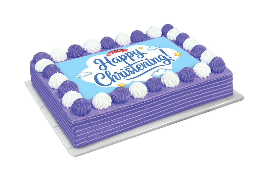 A rectangular frosted cake on a white background, decorated with purple and white piped frosting borders and a light blue top featuring the words 'Happy Christening!' in blue script.